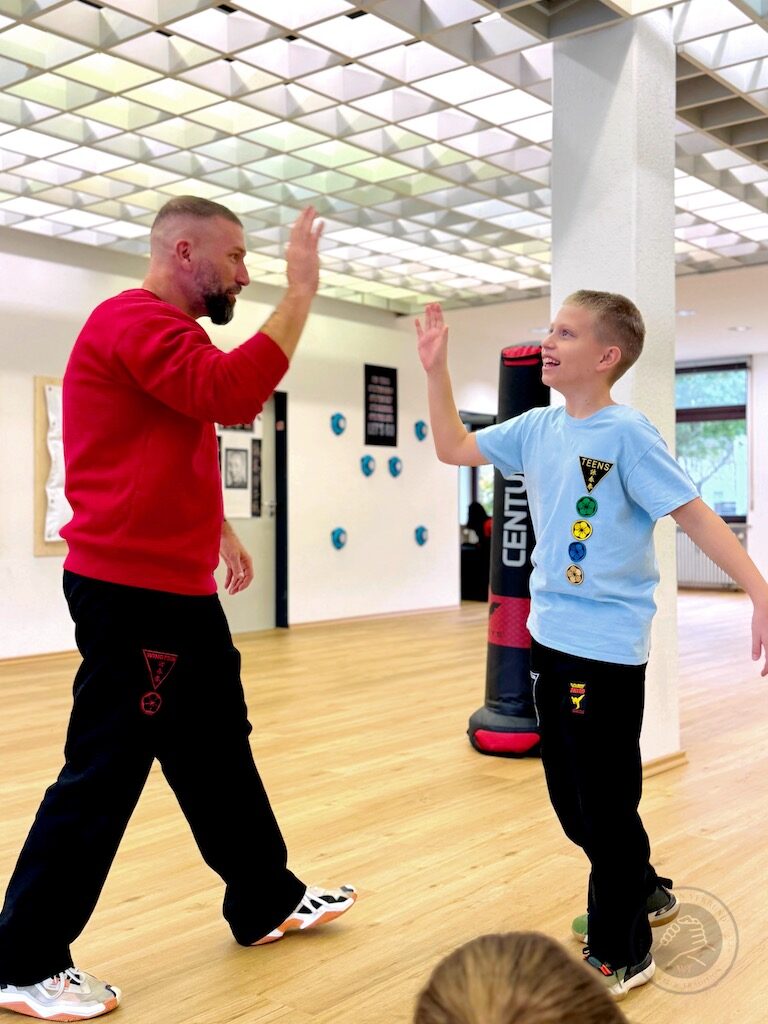 High Five mit dem Trainer